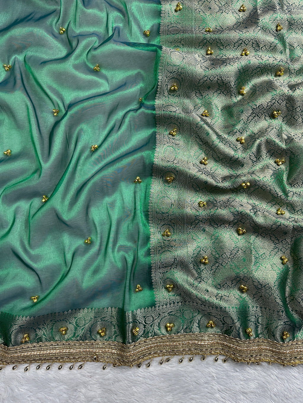 Sea Green Tissue Silk Saree With Golden Ghungroo Butti Work & Luxury Lace Border