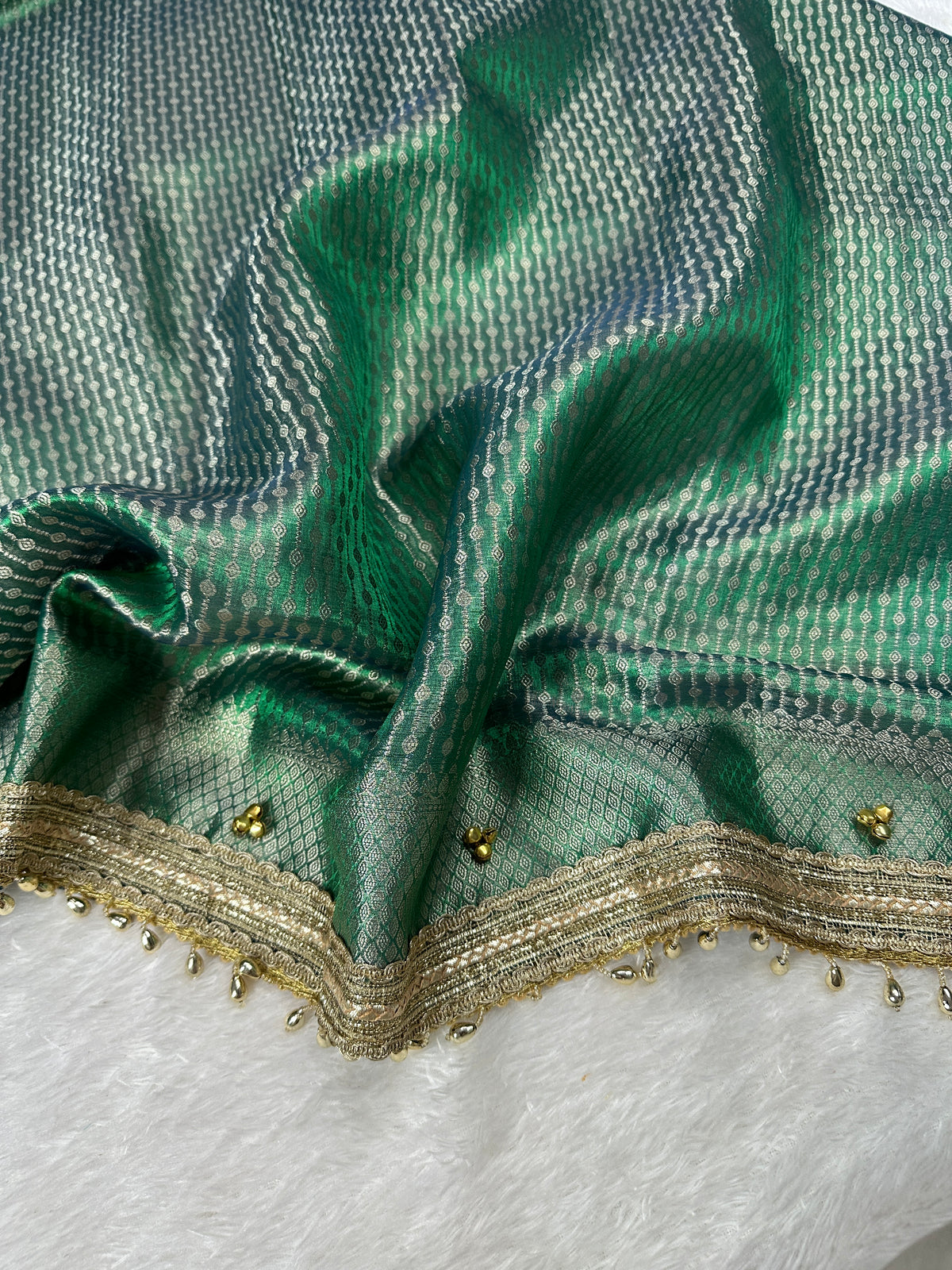Sea Green Tissue Silk Saree With Golden Ghungroo Butti Work & Luxury Lace Border