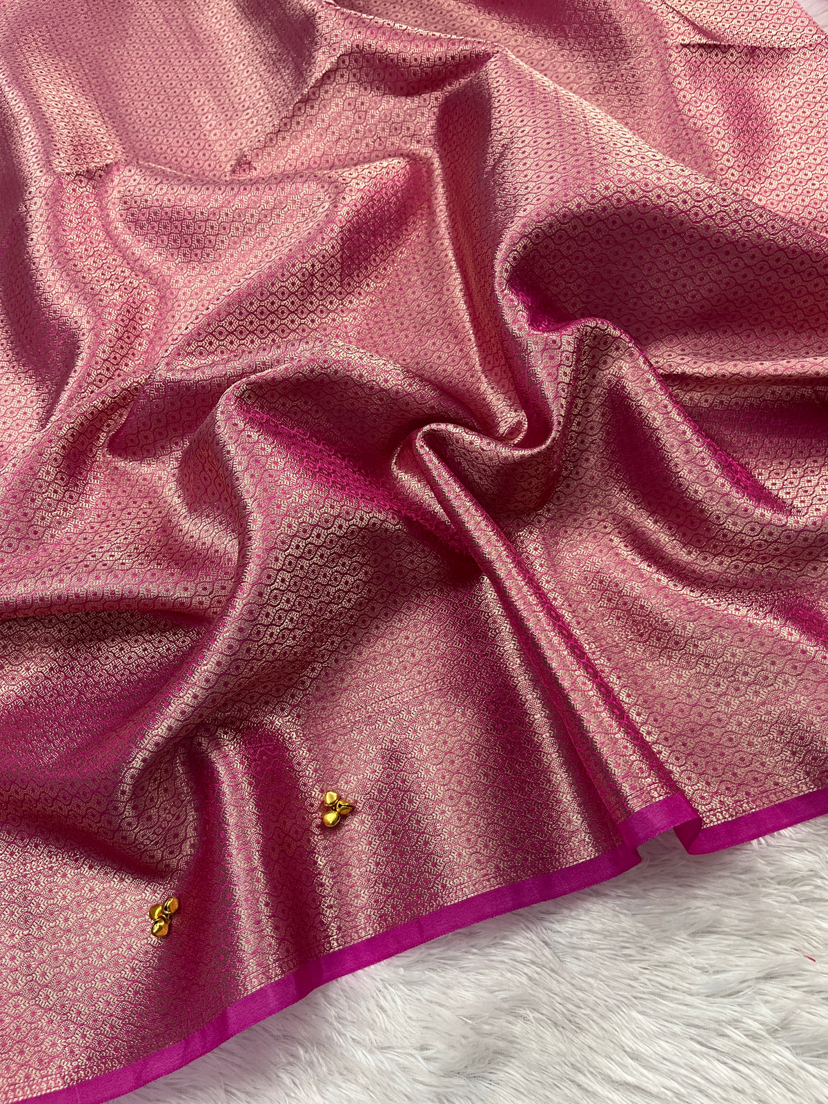 Rani Tissue Silk Saree With Ghungroo Butti Work & Luxurious Border