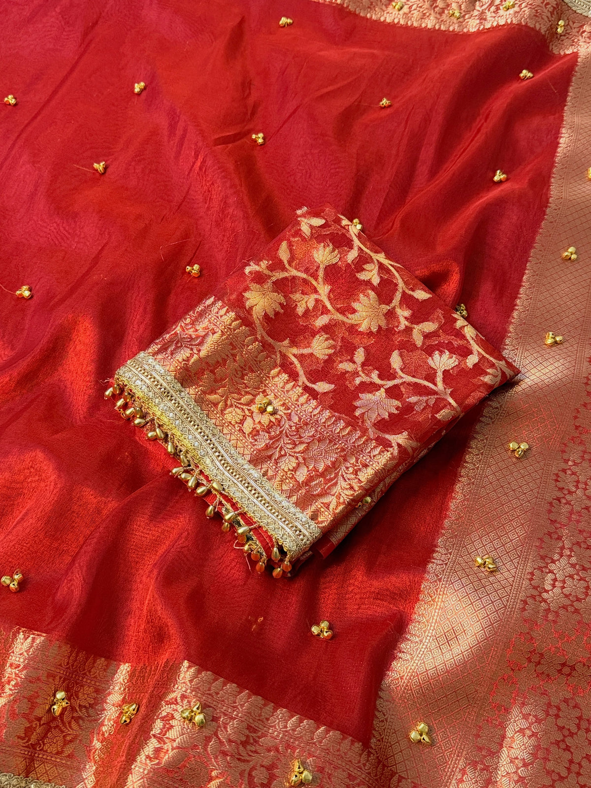 Red Tissue Silk Saree With Golden Ghungroo Butti Work & Luxury Lace Work Border